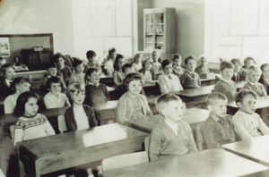 Photograph of children in class in the new school
