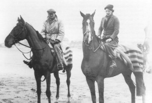 Powell with his wife, Charlie, both on horses