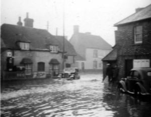 Photograph of flood in The Square looking towards The Crown- February 1940