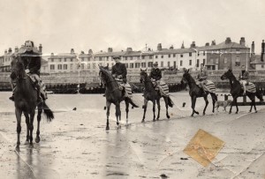 Horse trainer Bay Powell's string of horses on the beach at Bognor Regis