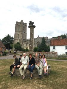 Goddard Family sitting at the market cross during their tour